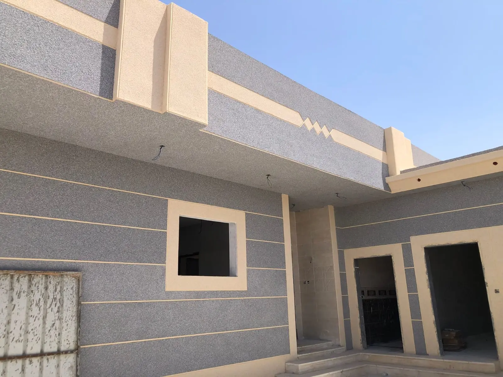 واجهة أمامية لفيلا مودرن مع مرآب